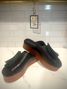 Kelsi Dagger Black Leather Platform Slide Sandals with Wood-Tone Sole